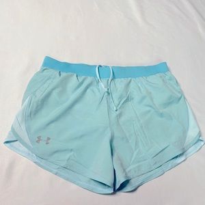 Blue athletic shorts with adjustable strings